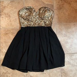 Black and gold sequin mini dress